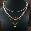 Bohemian mehrlagige Halskette mit bunten Fimo-Perlen, Krone und Schleifen-Anhänger - Stil T