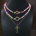 Boho handgefertigte bunte Heishi-Perlenketten und goldene Schleifenanhänger F G H - Stil H