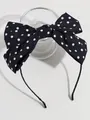 Klassieke zwart-witte polkadot strik haarband voor een retro en stijlvolle haarstijl - Zwarte Stip Hoofdband