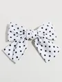 Elegante witte stoffen haarstrik clip met klassiek zwart stippenpatroon ontwerp - Witte Haarclip Met Stippen