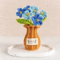 Blue handmade crochet forget-me-not flowers in a yellow knitted vase for desk - Gradient Blue Forget-me-not