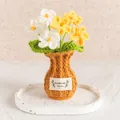 Handmade crocheted yellow and white flower bouquet in a knitted brown vase for home decor - Gradient Yellow Forget-me-not