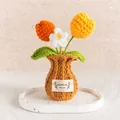 Handmade crochet tulip plant featuring orange and yellow flowers in a brown knit vase - Tulip Orange