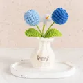 Hand-crocheted blue tulip potted plant decoration featuring a white knitted flower vase - Tulip Blue