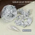 Detailed view of silver nail art foil flakes with application on manicured nail tips - Large Silver