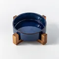 Premium kiln-transformed blue ceramic pet bowl featuring an elevated natural wood stand - Kiln Glazed Blue Water Bowl With Single Stand / Medium