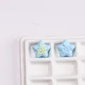 Light blue star acrylic beads with hand-painted yellow spiral for DIY jewelry making - Blue
