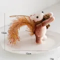 Small plush squirrel Christmas tree ornament holding a pine cone, height 10cm, width 15cm - Style B Brown