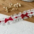 Detailed view of French Lolita white lace trim with red ribbon bows for DIY craft - Red Ribbon