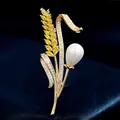Exquisito broche de espiga de trigo dorado con circonitas amarillas y perla - B034