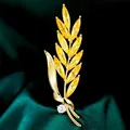 Exquisito broche de espiga de trigo con circonitas amarillas sobre metal chapado en oro - B521