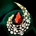 Elegante broche de lujo con una gran piedra roja en forma de gota y circonitas - B587