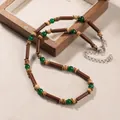 Handmade bohemian necklace with coconut shell wood beads and green accent stones for men - ZJ16357
