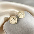 Elegant vintage French square pearl stud earrings featuring a delicate gold bow design - 45# White Square Pearl Earrings