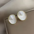 Elegant French vintage pearl stud earrings with scalloped shell texture in gold frame - 60# Geometric Texture Oval Pearl Stud Earrings