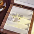 Elegant gold-plated bowknot stud earrings featuring pavé crystals and round white pearl drops - 59# Zircon Bow Pearl Earrings