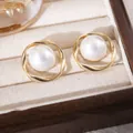 Elegant pearl stud earrings with gold-toned twisted metal frame, chic vintage style - 56# Hollow Geometric Pearl Stud Earrings