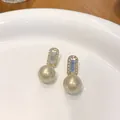 Elegant champagne pearl stud earrings with crystal geometric accents in gold-tone - 58# Zircon Geometric Pearl Earrings