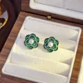 Vintage green enamel flower stud earrings with pearl center displayed in a wooden box. - 81# Oil-drop Camellia Pearl Earrings
