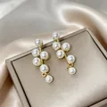 Elegant pearl cluster vine earrings in gold finish on jewelry box - 68# Pearl Tassel Earrings