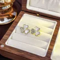 Elegant gold-tone butterfly stud earrings featuring a center pearl and white shimmering inlay - 73# Micro-painted Clover Pearl Stud Earrings
