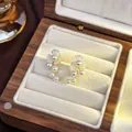 Elegant pearl flower cluster stud earrings presented in a luxury wooden jewelry box - 90# Flower Pearl Earrings