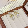 Elegant French vintage heart and bow pearl earrings with iridescent finish and gold plating - 95# Heart-shaped Zircon Bow Pearl Earrings