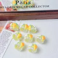 Close-up of hand-painted resin beads with cute yellow fruit patterns for DIY jewelry making - Pineapple Style / 16mm (Hole approx 2.5mm)