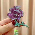Eleganter Rosenbrosche mit rosa und grünen Zirkonsteinen voll besetzt - B1688