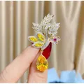 Luxuriöse Schmetterlingsbrosche mit Zirkonia und gelbem birnenförmigem Edelstein. - B030