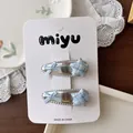 Sweet silver hair clips for girls with light blue bow and plaid star on display card - Star Plaid BB Hair Clips