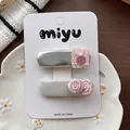 Silver metallic hair clip set with pink roses and pearl detail on display card - Square Flower BB Hair Clips