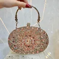 Elegante Abendtasche mit rosa Kristallen und goldenem Griff für festliche Anlässe - Champagner