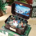 Caja de música navideña de resina con muñeco de nieve giratorio y escena iluminada - Caja de Música de Figuras Giratorias