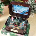 Caja de música de Navidad en resina con tren giratorio, Papá Noel y LED - Caja de Música de Tren Giratorio