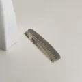 Elegant mini acetate wide-tooth comb featuring a grey marble pattern for portable hair care - Gray Marble Texture