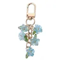 Fresh light blue translucent double-petal flower keychain with elegant gold-tone bag charm - Blue Lily D-Buckle (Double Petals)