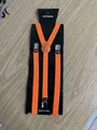Bright orange elastic suspenders for boys featuring sturdy non-slip metal clips - 24 Orange
