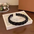Elegant black sequined braided headband for women, stylish autumn winter hair accessory. - Black Sequin Braided Style