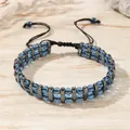 Pulsera artesanal de doble hilera de cuentas azules con detalles de hematita y cordón trenzado. - Zj17005 Azul Transparente