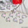 Colgante de corazón rosa opalescente con flecha y pedrería para joyas, 20x15x4mm - Rosa