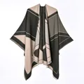 Detailed close-up view of women's color block cashmere-like poncho with elegant fringed edges - Big V Short Beard Shawl Black Card / 130x150cm