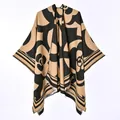 Detail showing the large floral pattern on a reversible warm beige and black cloak shawl. - New Short-bearded Camellia Black And Yellow / 130x150cm