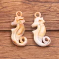 Pendentifs hippocampe en acrylique avec texture marbre pour bijoux - Coquillage 11 X 27 Mm 08 G / 1 pièce