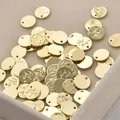 Close-up of 14k gold plated round pendant tags with cursive engraving for DIY jewelry. - 66# 14k Round [1 Piece] A1-503 (approx. 9.2mm)