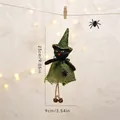 Hanging Halloween black cat ornament in green burlap witch hat and dress with dimensions - Black Cat Doll Hanging