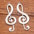 Silver musical note treble clef pendant for DIY jewelry making on wood background - No. 35 Treble Clef Charm / 21x61mm (5.4g) / Antique Silver