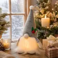 Handmade glowing Christmas gnome featuring a grey knit hat and warm LED beard decoration - Grey