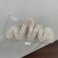Acetate wave hair claw clip in pearlescent finish, measuring 13cm long and 6.3cm high - 8-large Champagne