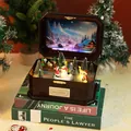 Boîte à musique de Noël avec bonhomme de neige rotatif et lumières LED en résine brune - Boîte à Musique Figurines Rotatives